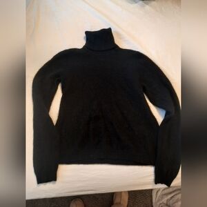 Black cashmere turtleneck sweater